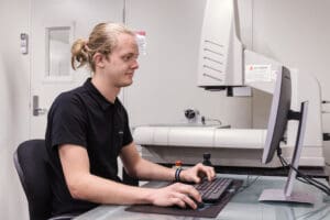 Zenith Tecnica worker on a computer